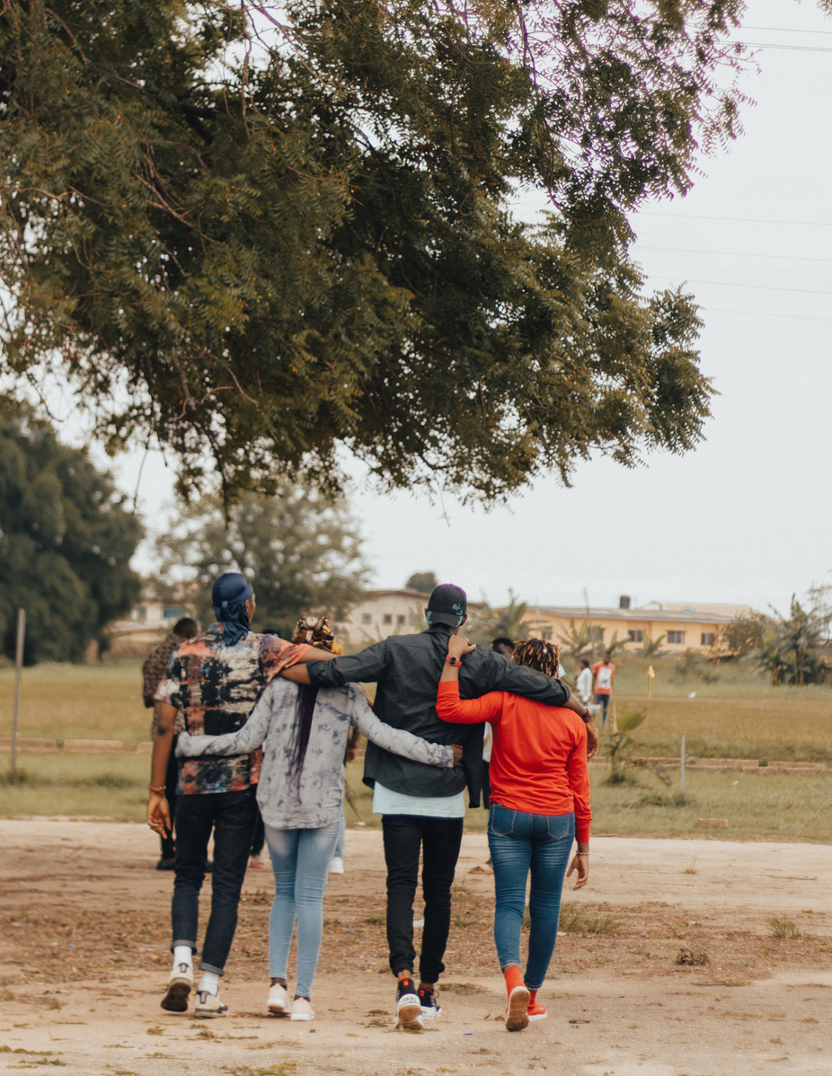 Group of Youth Walking Together at the Park